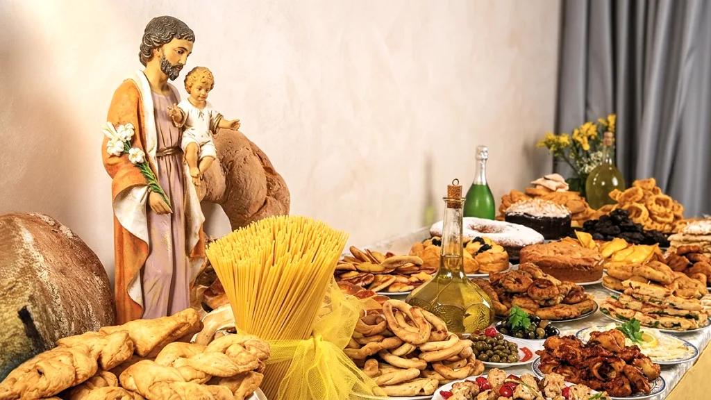Tavola imbandita con le pietanze tradizionali del pranzo di San Giuseppe a Riccia.